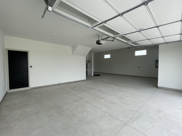 2240 Little Rock Rd, Emmett, ID 83616 - garage with a garage door opener and baseboards