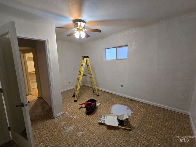 game room featuring crown molding and ceiling fan