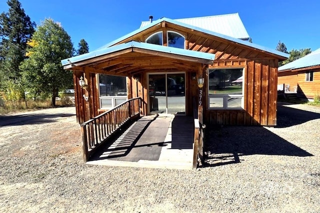 379 S Mill St, Sumpter, OR 97877 - view of front of house with board and batten siding