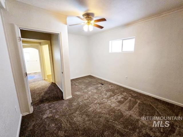 379 S Mill St, Sumpter, OR 97877 - carpeted spare room with ceiling fan, ornamental molding, and baseboards