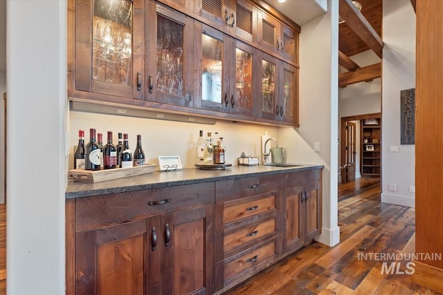 212 Ferguson Way, Mccall, ID 83638 - indoor dry bar with dark wood-type flooring and baseboards
