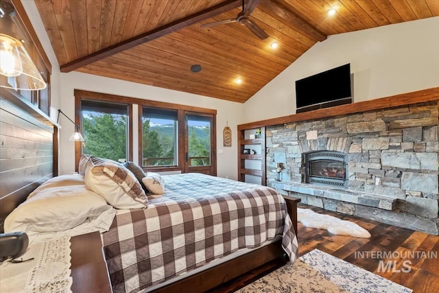 212 Ferguson Way, Mccall, ID 83638 - bedroom with wood finished floors, wood ceiling, and a fireplace