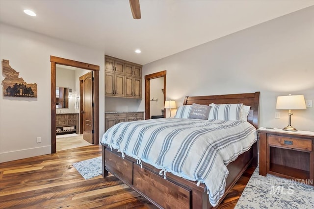 212 Ferguson Way, Mccall, ID 83638 - bedroom with baseboards, wood finished floors, recessed lighting, connected bathroom, and a ceiling fan