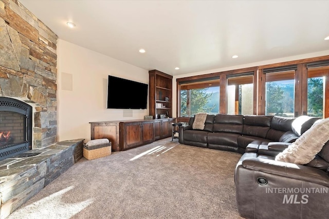 212 Ferguson Way, Mccall, ID 83638 - living room with carpet floors, a fireplace, and recessed lighting