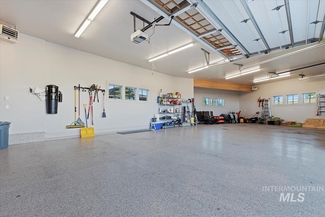 212 Ferguson Way, Mccall, ID 83638 - garage with a garage door opener and a central vacuum unit