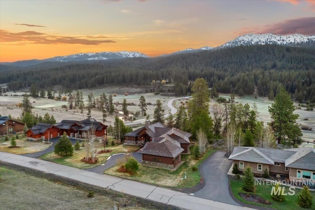 212 Ferguson Way, Mccall, ID 83638 - aerial view at dusk of a mountain view and a wooded view