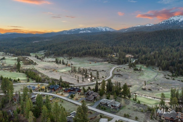 212 Ferguson Way, Mccall, ID 83638 - aerial view at dusk of a wooded view and a mountain view
