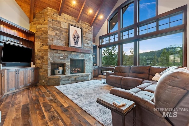 212 Ferguson Way, Mccall, ID 83638 - living room featuring wooden ceiling, hardwood / wood-style flooring, high vaulted ceiling, beamed ceiling, and a fireplace
