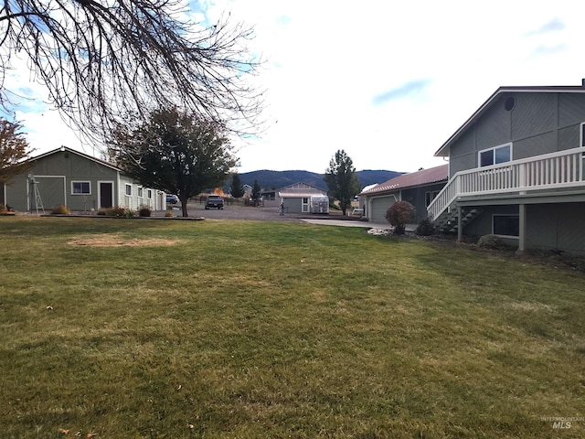 view of yard with a garage