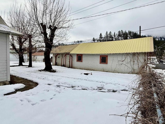 view of yard covered in snow