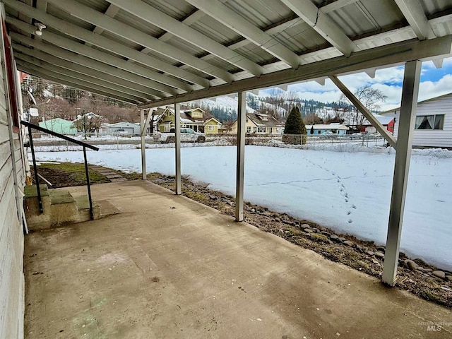 view of snow covered patio