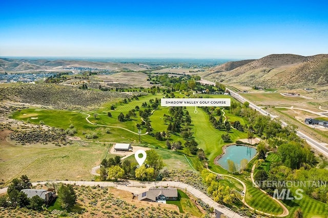 8425 W Spring Creek Way, Boise, ID 83714 - drone / aerial view featuring view of golf course and a water and mountain view