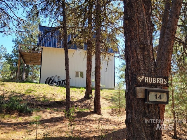 view of side of property with a deck