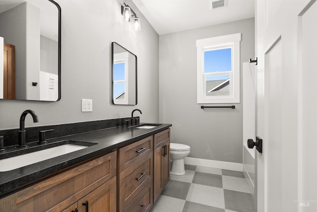 full bath with baseboards, a sink, visible vents, and tile patterned floors