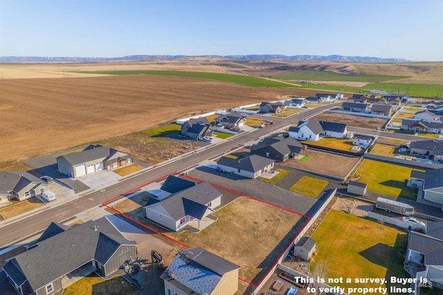 aerial view with a residential view and a mountain view