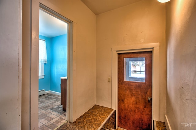 entrance foyer with a baseboard radiator