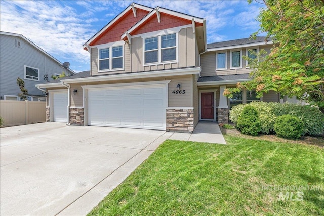 4665 N Beaham Ave, Meridian, ID 83646 - craftsman-style house with stone siding, concrete driveway, board and batten siding, and a garage