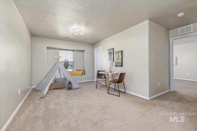 4665 N Beaham Ave, Meridian, ID 83646 - recreation room with carpet flooring, a textured ceiling, and baseboards
