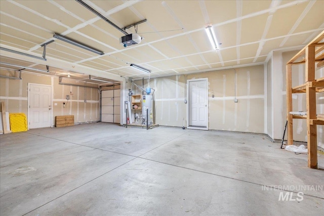 4665 N Beaham Ave, Meridian, ID 83646 - garage with a garage door opener and water heater