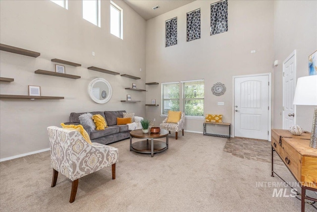 4665 N Beaham Ave, Meridian, ID 83646 - carpeted living room featuring a towering ceiling, plenty of natural light, and baseboards