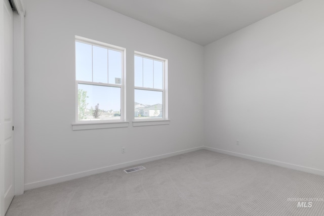 8601 W Pond Pine St, Star, ID 83669 - spare room with light carpet and baseboards
