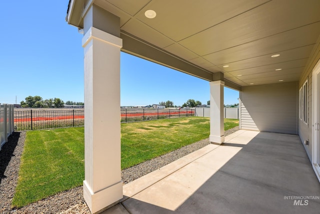 8601 W Pond Pine St, Star, ID 83669 - fenced backyard with a patio area and a carport