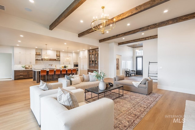 3426 N Hardwick Ave, Eagle, ID 83616 - living area featuring a chandelier, recessed lighting, light wood-type flooring, and beamed ceiling