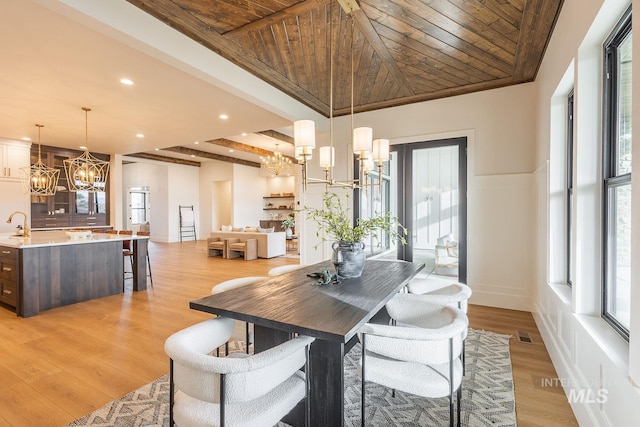 3426 N Hardwick Ave, Eagle, ID 83616 - dining room featuring a chandelier, healthy amount of natural light, light wood-type flooring, wood ceiling, and recessed lighting