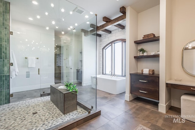 3426 N Hardwick Ave, Eagle, ID 83616 - bathroom with a shower stall, a freestanding bath, beam ceiling, tile patterned floors, and recessed lighting