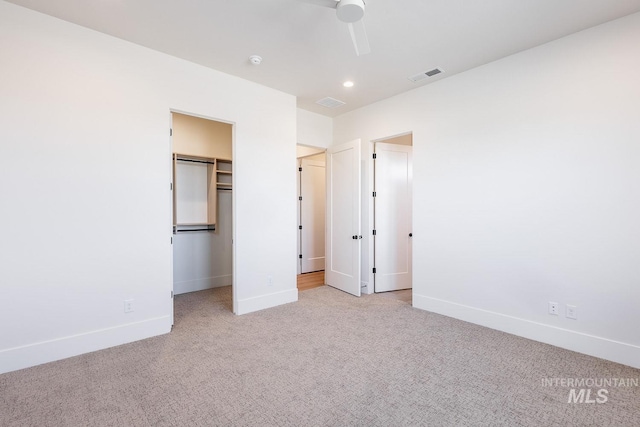 3426 N Hardwick Ave, Eagle, ID 83616 - unfurnished bedroom featuring carpet floors, a walk in closet, recessed lighting, ceiling fan, and a closet