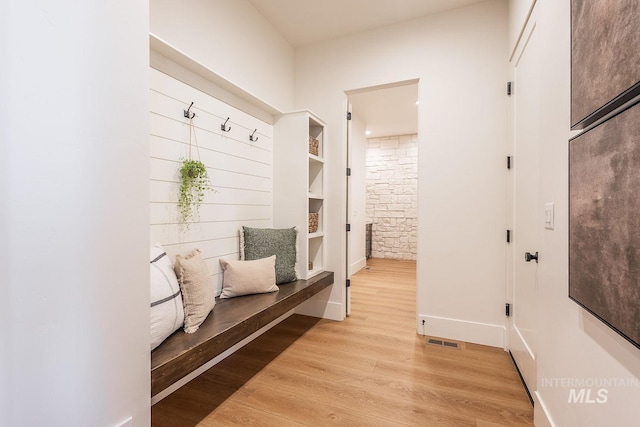 3426 N Hardwick Ave, Eagle, ID 83616 - mudroom with light wood-type flooring and built in shelves