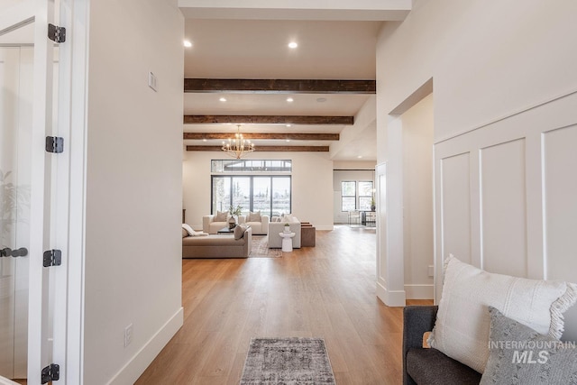 3426 N Hardwick Ave, Eagle, ID 83616 - corridor with beam ceiling, light wood-style flooring, a chandelier, and recessed lighting