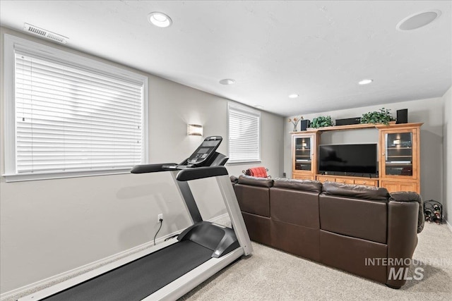 exercise area with visible vents, recessed lighting, baseboards, and carpet floors