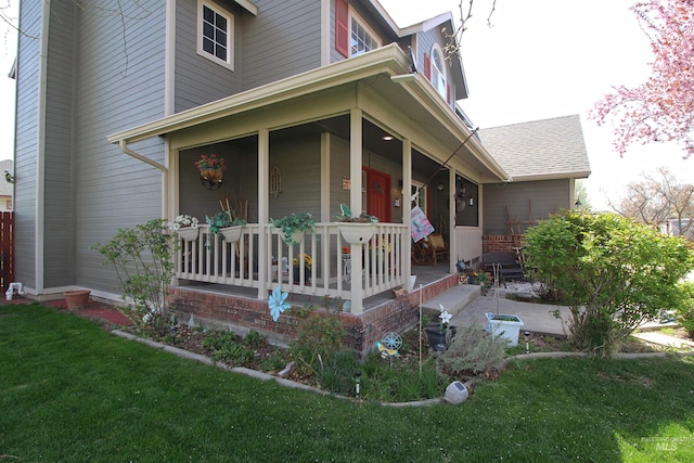 exterior space featuring a yard and a porch