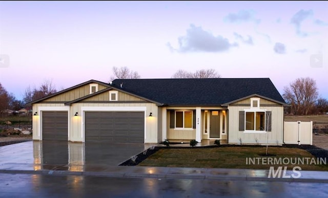 view of front facade with covered porch and a garage