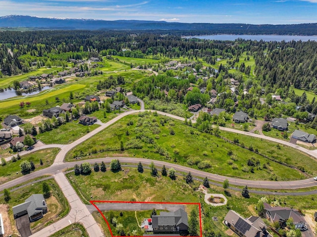 1017 Potts Dr, Mccall, ID 83638 - aerial perspective of suburban area featuring property boundaries highlighted, a large body of water, and a heavily wooded area