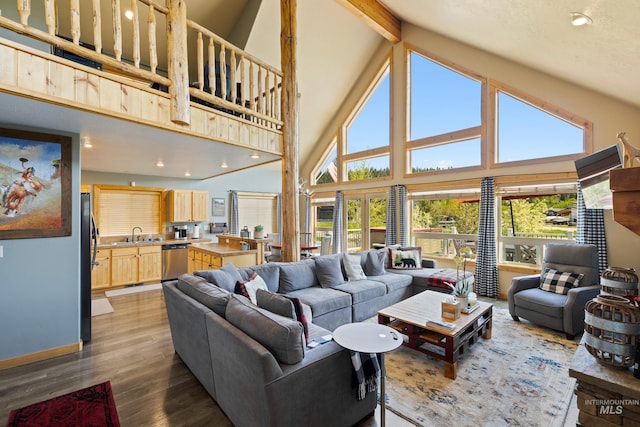1017 Potts Dr, Mccall, ID 83638 - living area featuring high vaulted ceiling, wood finished floors, beamed ceiling, and recessed lighting
