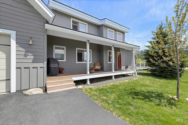 1017 Potts Dr, Mccall, ID 83638 - view of front of property featuring covered porch and a front lawn
