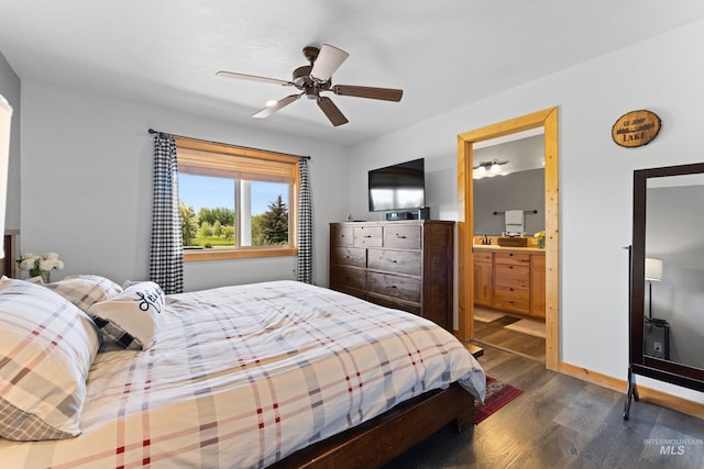 1017 Potts Dr, Mccall, ID 83638 - bedroom featuring dark wood-style flooring, ensuite bath, ceiling fan, and a sink