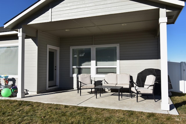 view of patio / terrace featuring fence and an outdoor hangout area