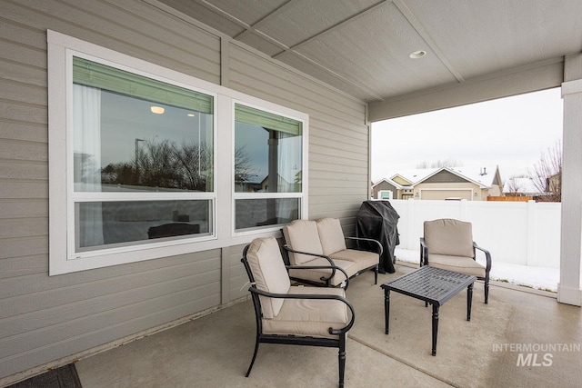 view of patio with fence and grilling area