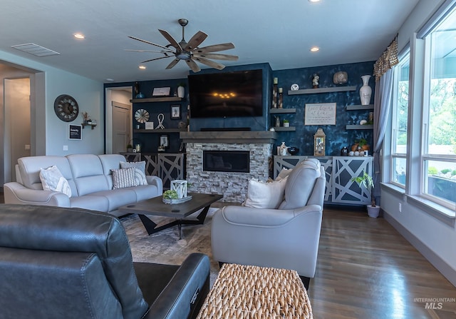 9473 W Suttle Lake Dr, Boise, ID 83714 - living room with ceiling fan, a fireplace, wood finished floors, baseboards, and recessed lighting