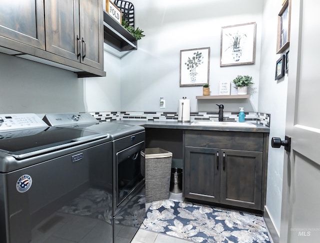 9473 W Suttle Lake Dr, Boise, ID 83714 - laundry room featuring washer and clothes dryer and cabinet space