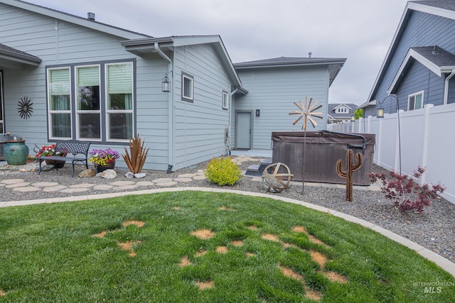 9473 W Suttle Lake Dr, Boise, ID 83714 - back of house featuring a hot tub