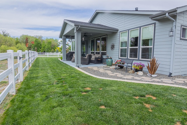 9473 W Suttle Lake Dr, Boise, ID 83714 - view of yard with ceiling fan, outdoor lounge area, and a patio area