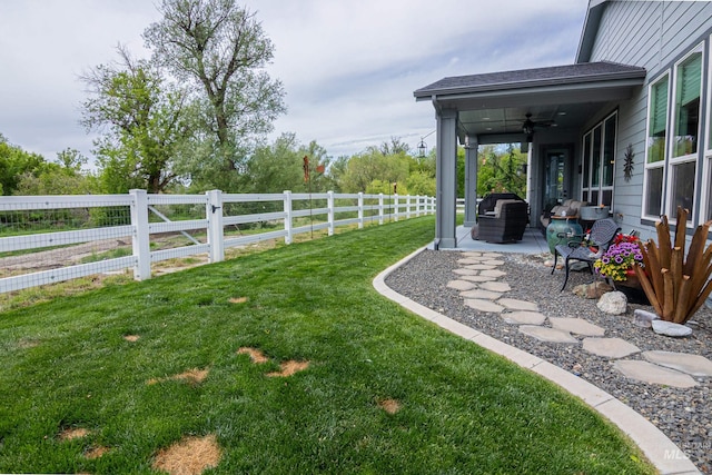 9473 W Suttle Lake Dr, Boise, ID 83714 - view of yard featuring a ceiling fan and a patio area