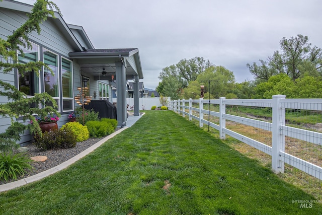 9473 W Suttle Lake Dr, Boise, ID 83714 - view of yard featuring ceiling fan