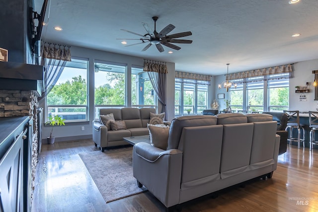 9473 W Suttle Lake Dr, Boise, ID 83714 - living area featuring plenty of natural light, ceiling fan, wood finished floors, and recessed lighting