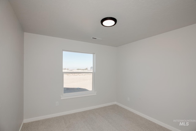 8196 E Red Horse St, Nampa, ID 83687 - empty room with light colored carpet, visible vents, and baseboards