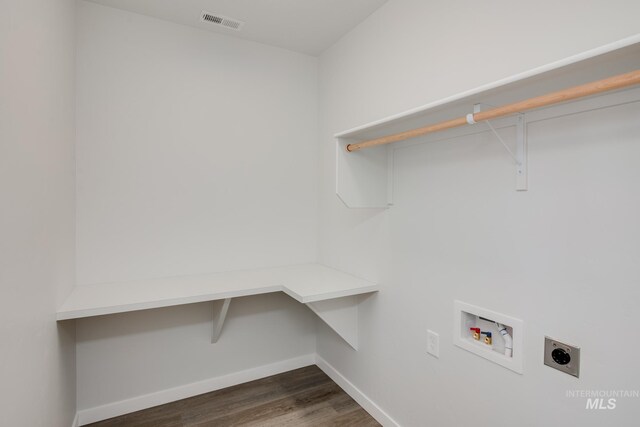 8196 E Red Horse St, Nampa, ID 83687 - clothes washing area with baseboards, hookup for a washing machine, laundry area, electric dryer hookup, and dark wood-style floors